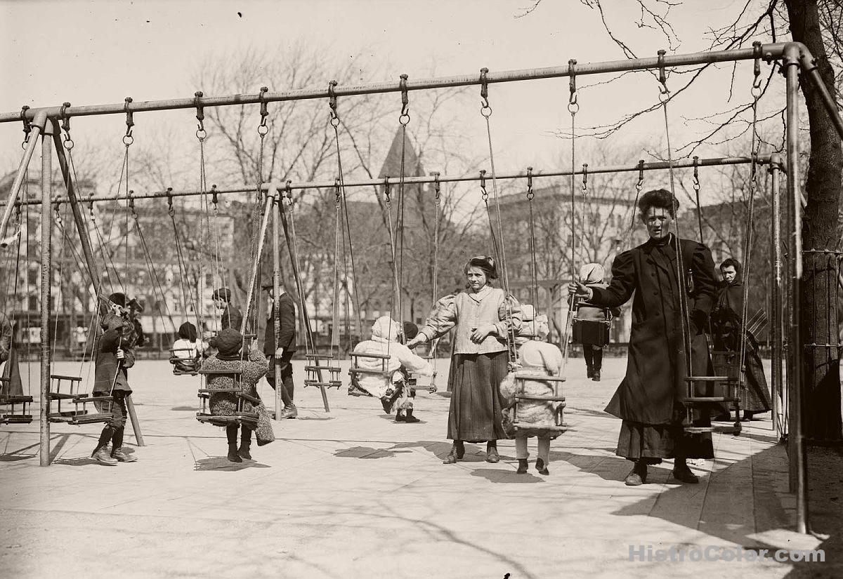 Children Play On Swings