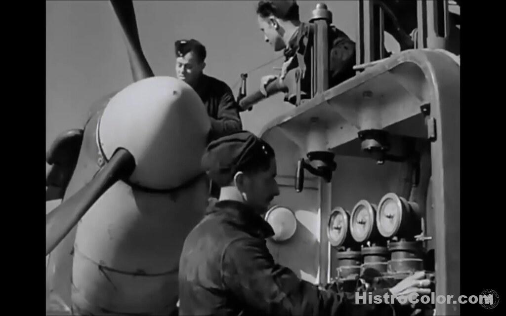 Mechanics Working On Fighter Plane