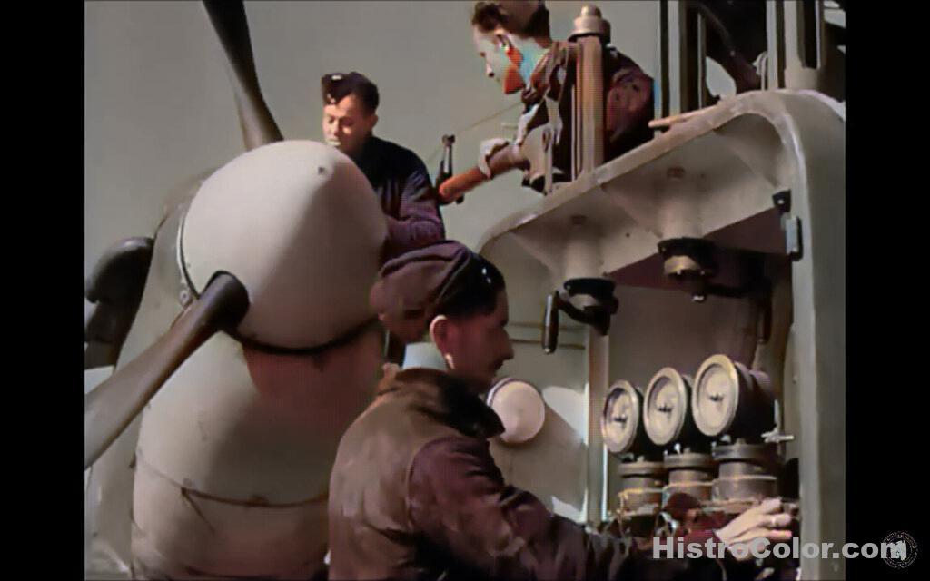 Mechanics Working On Fighter Plane
